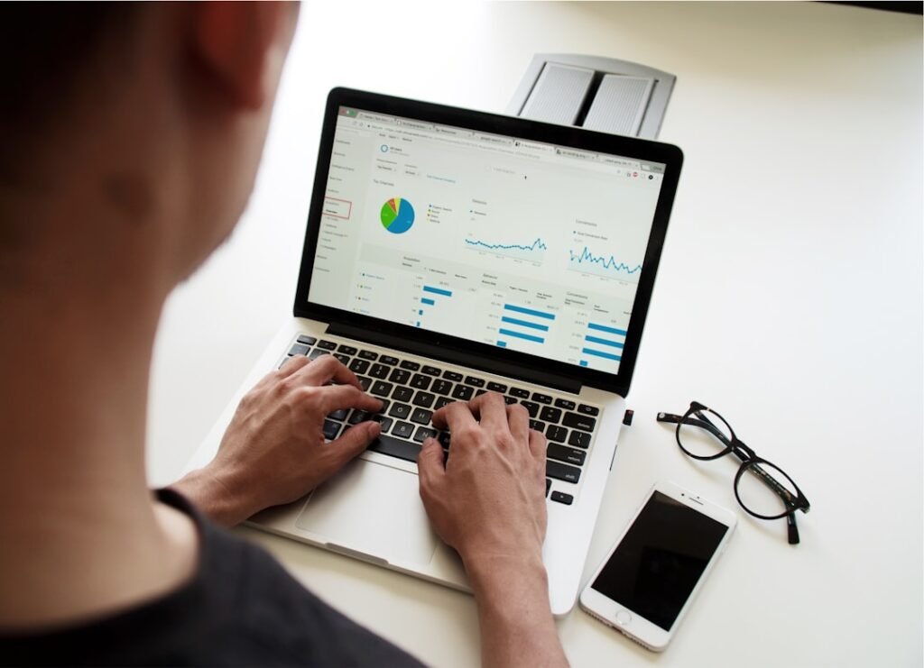 crunching the numbers on lap top